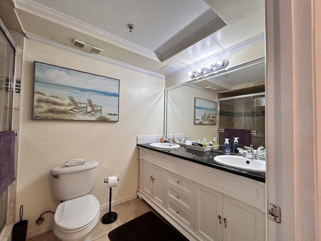 bathroom with vanity, a shower with door, crown molding, tile patterned flooring, and toilet