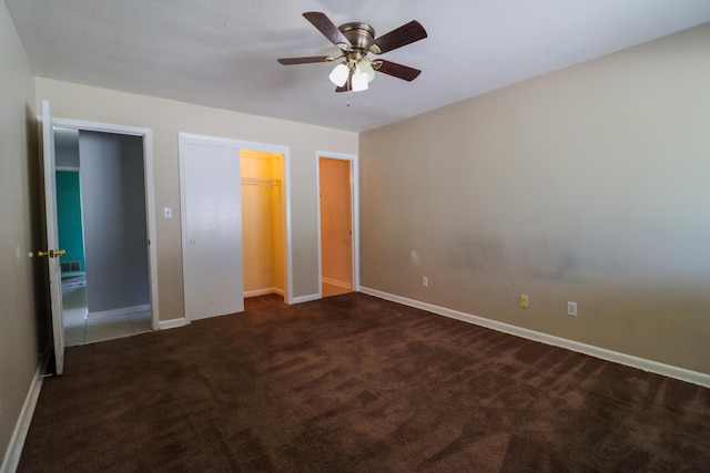 unfurnished bedroom with carpet floors, ceiling fan, and a closet