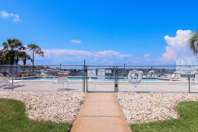 view of property's community with a pool