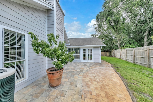 view of patio / terrace with cooling unit and french doors