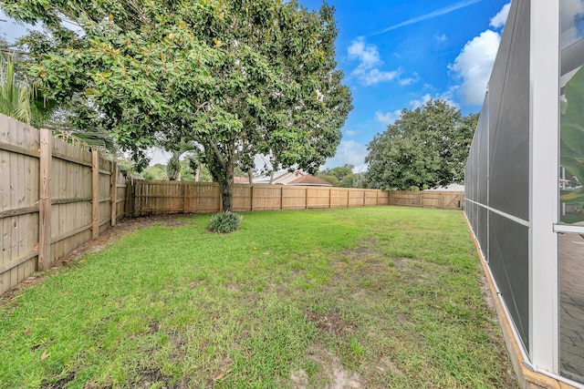 view of yard featuring a fenced backyard