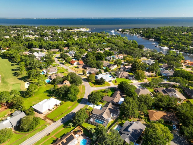 bird's eye view with a water view and a residential view