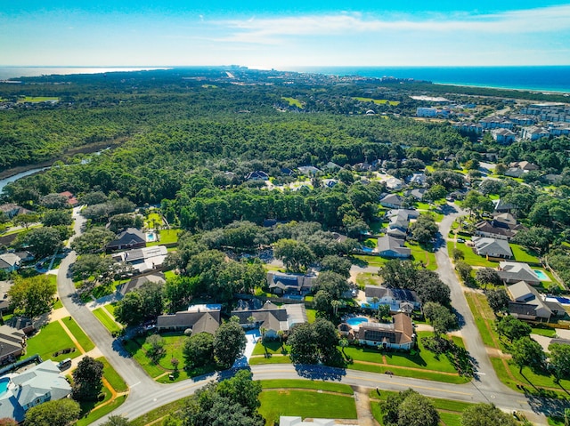 birds eye view of property featuring a water view and a residential view