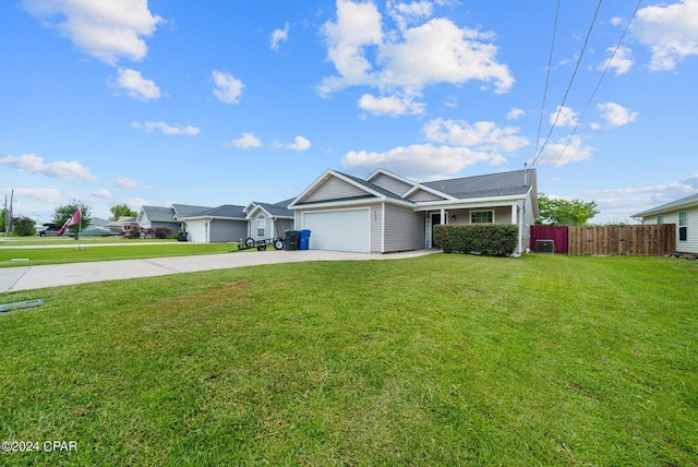 ranch-style home with a front lawn and a garage