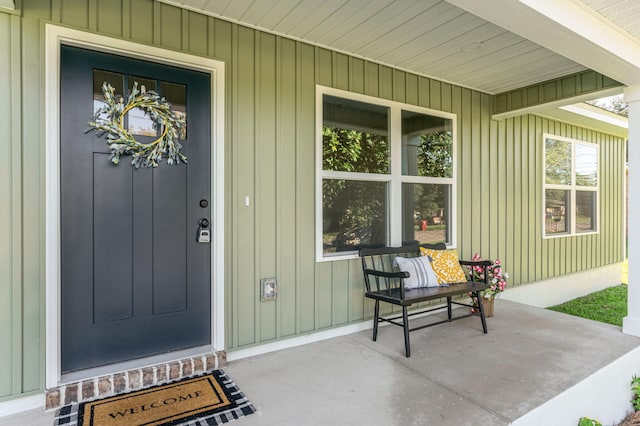 property entrance featuring covered porch