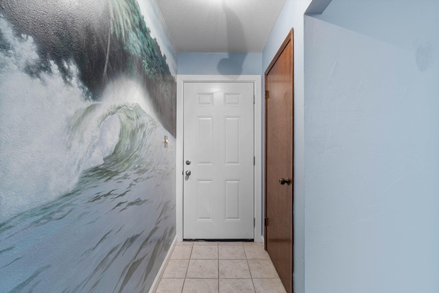 hallway with light tile patterned floors