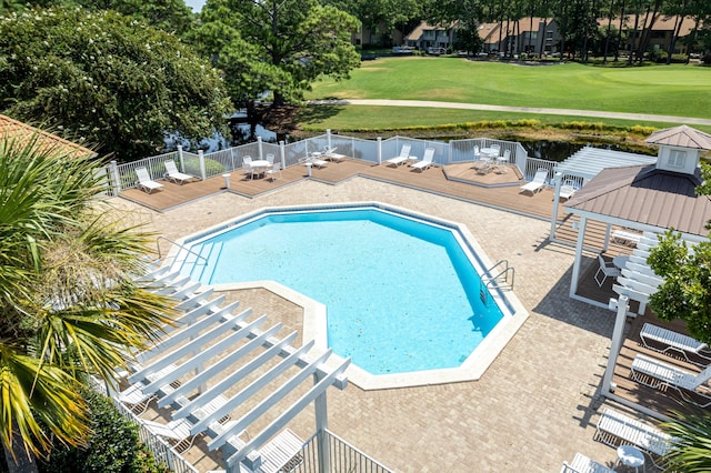 view of swimming pool featuring a lawn, a patio area, and a gazebo