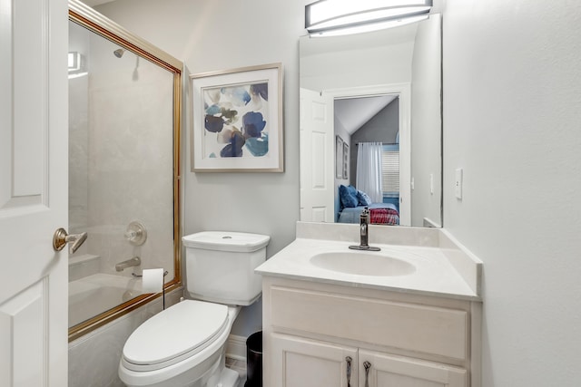 full bathroom with shower / bath combination with glass door, vanity, and toilet