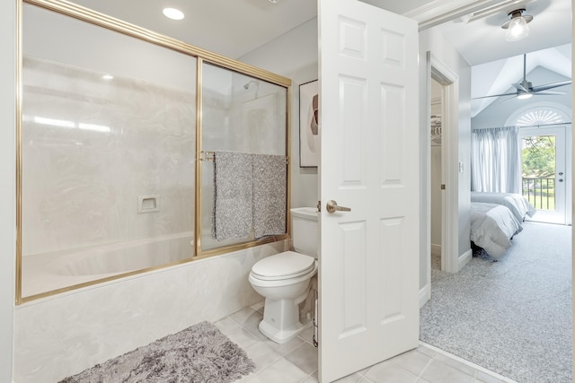 bathroom with lofted ceiling, tile patterned flooring, enclosed tub / shower combo, toilet, and ceiling fan