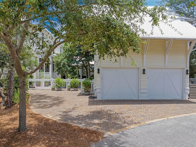 view of front of home with a garage