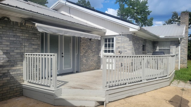 exterior space featuring a wooden deck