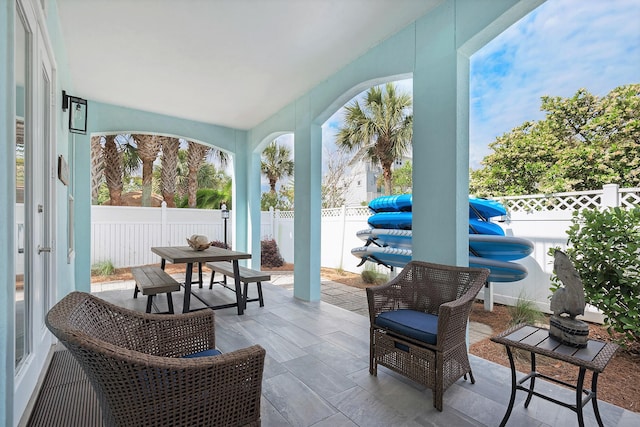 sunroom / solarium featuring a wealth of natural light