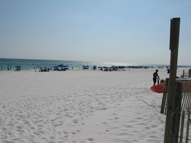 property view of water featuring a beach view