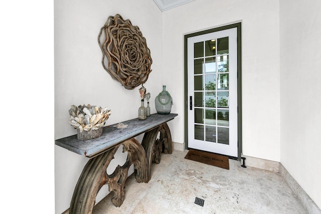 doorway with concrete floors