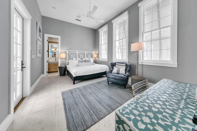 bedroom with a ceiling fan, visible vents, and baseboards