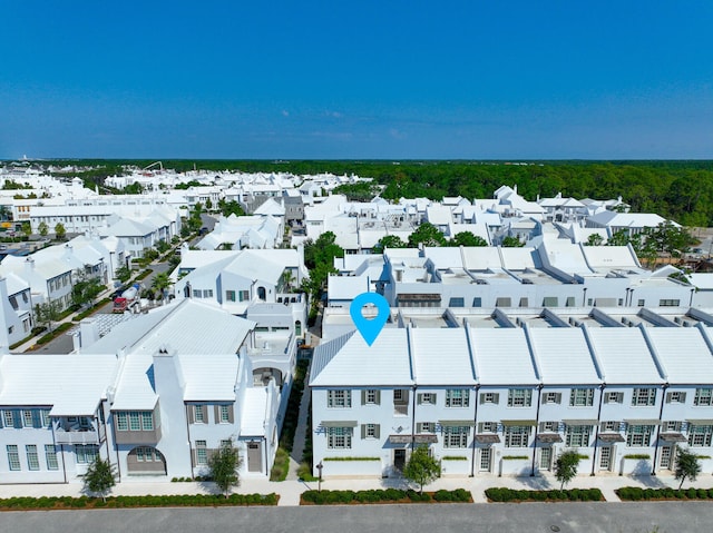 birds eye view of property with a residential view