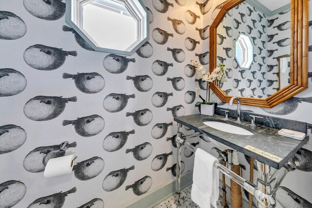 bathroom featuring plenty of natural light and vanity