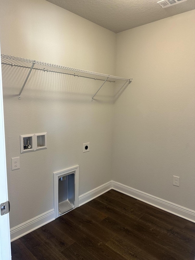 clothes washing area featuring washer hookup, dark wood-type flooring, and electric dryer hookup