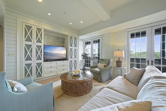 living room with light hardwood / wood-style floors and french doors