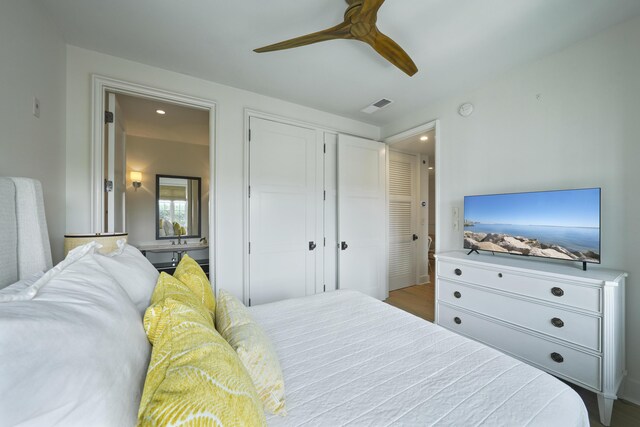 bedroom featuring ceiling fan and hardwood / wood-style floors