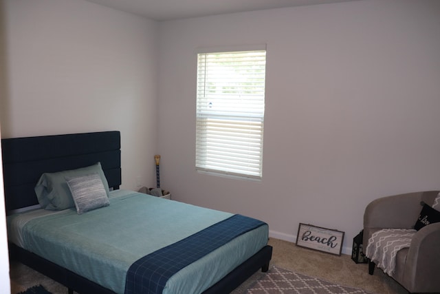 bedroom featuring carpet flooring