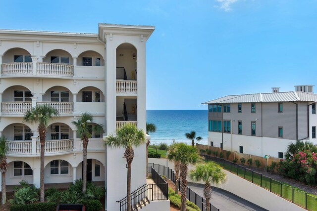 view of property with a water view