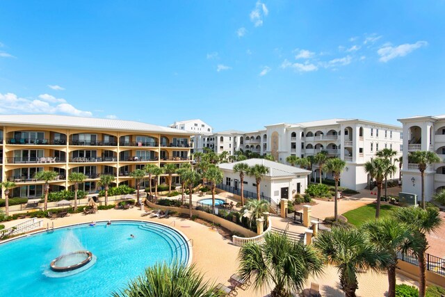 view of swimming pool featuring a patio