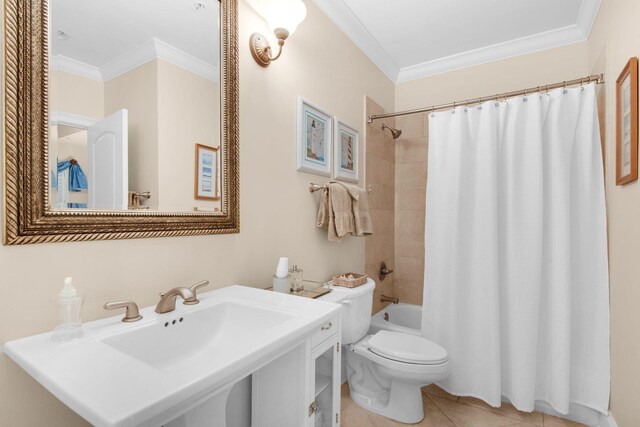 full bathroom with sink, ornamental molding, shower / bath combo with shower curtain, tile patterned flooring, and toilet