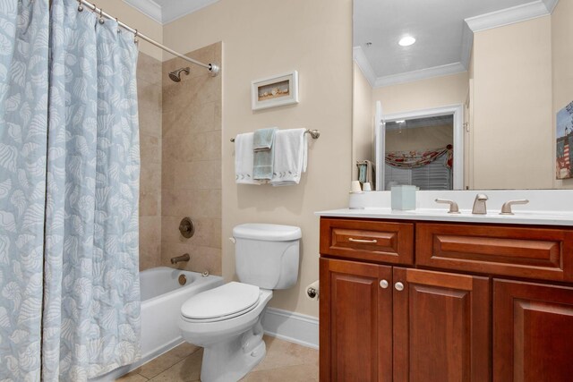 full bathroom with tile patterned floors, toilet, vanity, and ornamental molding