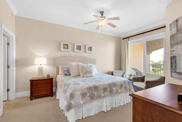 carpeted bedroom featuring ceiling fan, access to outside, and crown molding