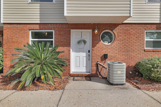 property entrance featuring central AC