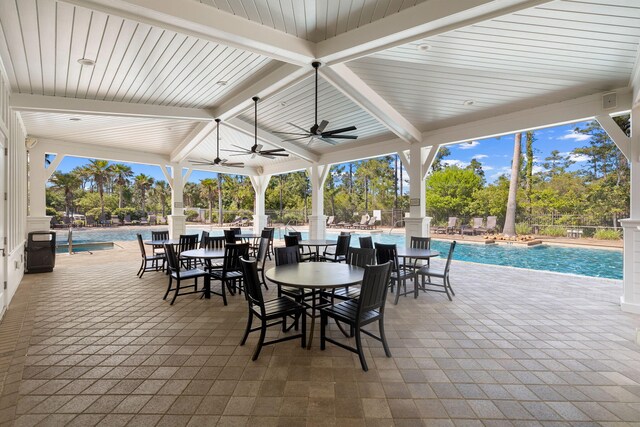 view of patio featuring ceiling fan