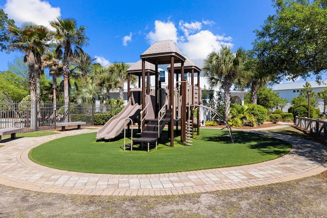 view of playground with a yard