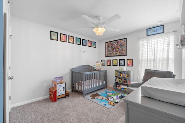 bedroom featuring ceiling fan and carpet flooring