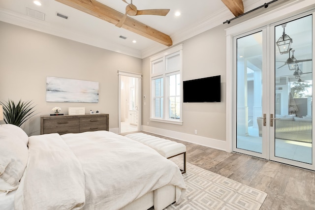 bedroom featuring access to outside, beamed ceiling, and french doors