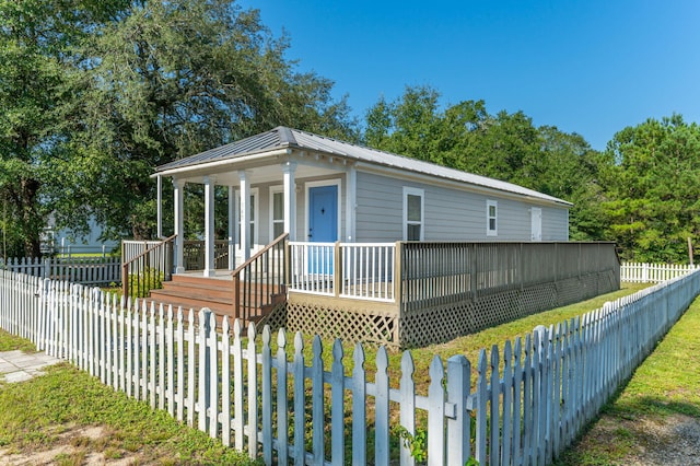 view of front of house featuring a deck