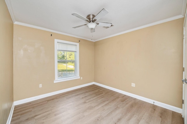 unfurnished room featuring ceiling fan, light hardwood / wood-style flooring, and ornamental molding