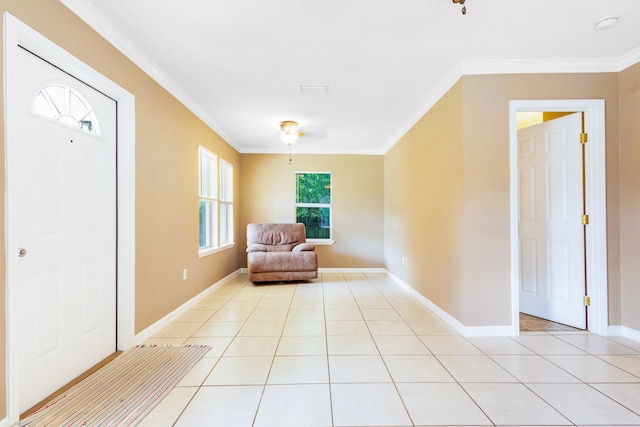 tiled entrance foyer with crown molding