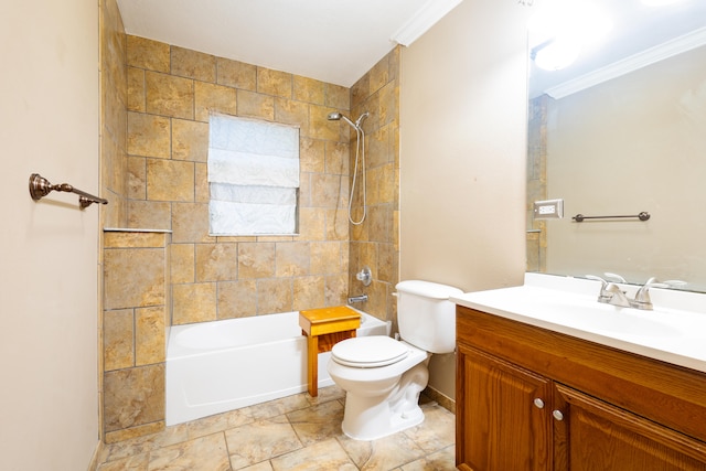 full bathroom with tiled shower / bath, toilet, ornamental molding, and vanity