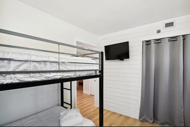 unfurnished bedroom with light hardwood / wood-style floors