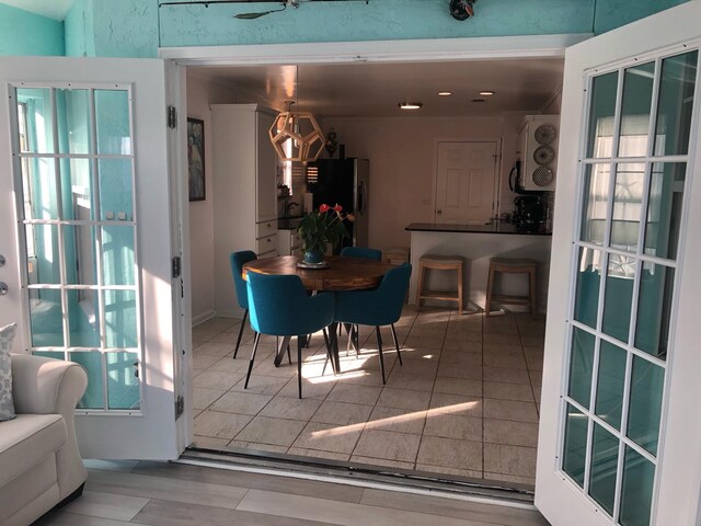 dining space featuring hardwood / wood-style floors