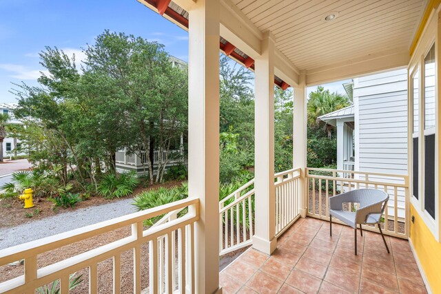 balcony featuring a porch