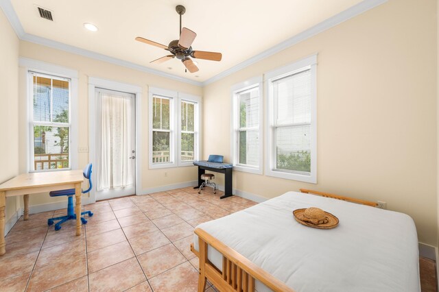 tiled bedroom featuring ceiling fan and ornamental molding