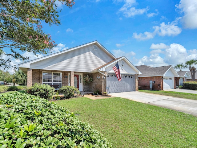 view of front of house featuring a garage, concrete driveway, brick siding, and a front yard