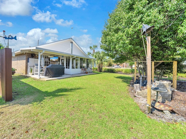 view of yard with a patio area