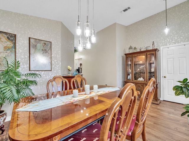 dining area with light wood-type flooring