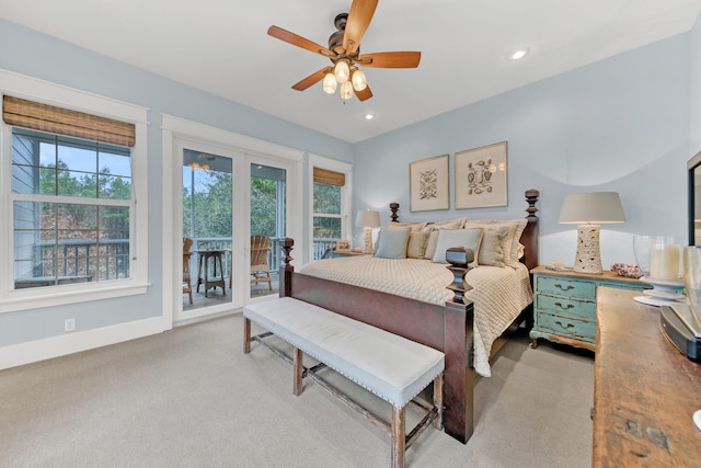 bedroom with ceiling fan, access to outside, and light carpet