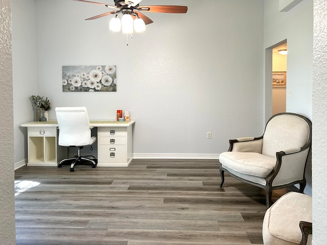 office space with ceiling fan and wood-type flooring