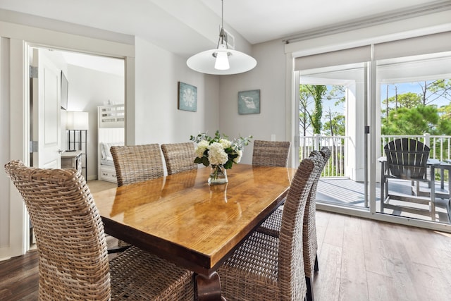 dining area featuring wood-type flooring