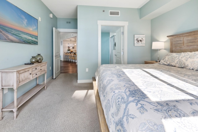 bedroom featuring light hardwood / wood-style floors